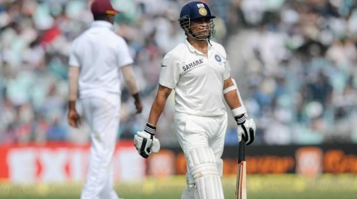 Sachin Tendulkar walks back to the pavilion after being dismissed by Shane Shillingford. BCCI Sachin Tendulkar India