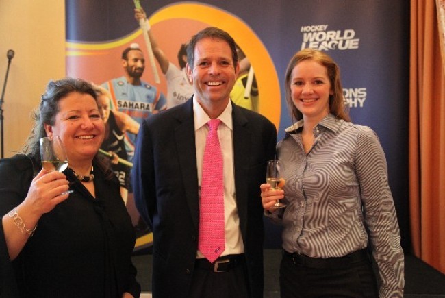 FIH Chief Executive Officer Kelly Fairweather (centre) with CEOs Sally Munday of England Hockey (left) and Hockey India's Elena Norman (right)