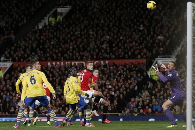 Manchester United striker Robin Van Persie scores against his former club Arsenal in the English Premier League, November 10. Reuters Robin Van Persie Manchester United