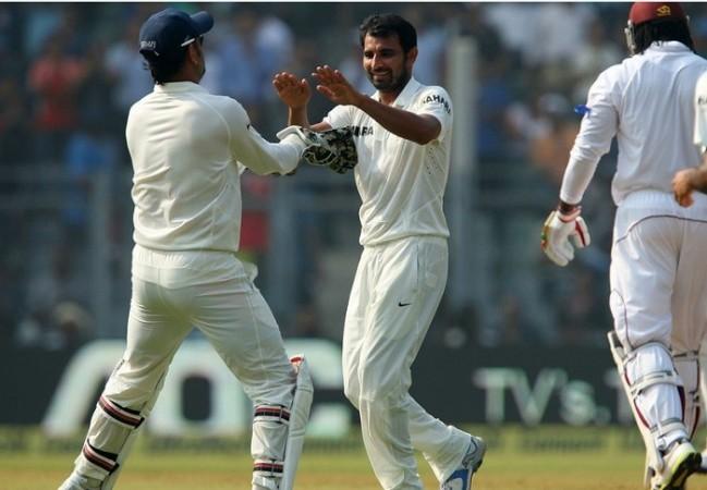 Mohammed Shami celebrates with MS Dhoni after dismissing Chris Gayle. BCCI Shami Dhoni Gayle India West Indies