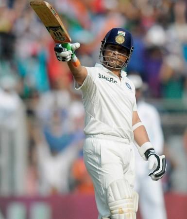Sachin Tendulkar celebrates after reaching his half-century. BCCI Sachin Tendulkar India