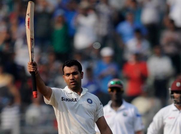 Rohit Sharma raises his bat after reaching his hundred. BCCI Rohit Sharma India