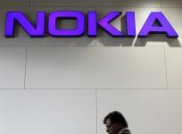 file-picture-shows-a-man-walking-past-a-nokia-logo-during-the-mobile-world-congress-in-barcelona-february-28-2012