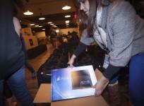 a-sony-employee-takes-a-playstation-4-out-of-the-box-in-advance-of-a-special-sale-event-put-on-by-sony-at-the-standard-hotel-in-new-york