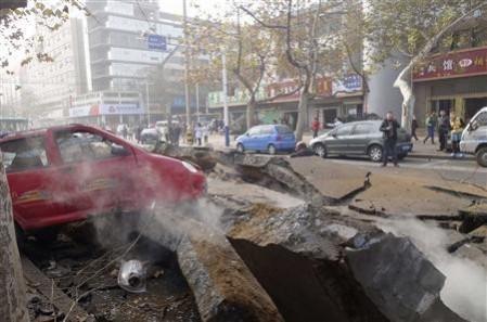 Man trapped in the debris after oil pipeline blasted in China Man trapped in the debris after oil pipeline blasted in China