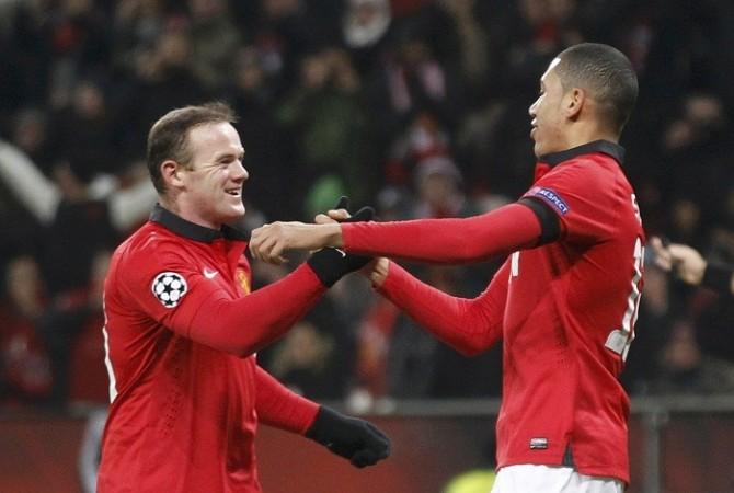 Wayne Rooney and Chris Smalling celebrate a goal against Bayer Leverkusen, November 27. Reuters Rooney Smalling Manchester United