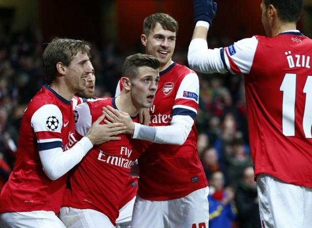 Arsenal players celebrate Jack Wilshere's goal against Marseille in the Champions League, November 26. Reuters Arsenal Wilshere Monreal Ramsey
