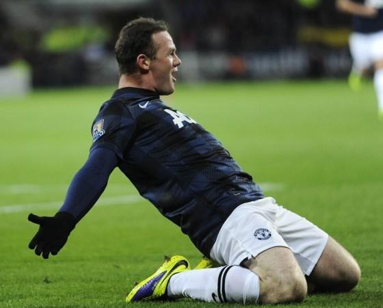 Manchester United forward Wayne Rooney celebrates a goal against Cardiff, November 24. Reuters Wayne Rooney Manchester United