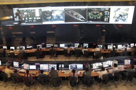 Indian Space Research Organization (ISRO) scientists and engineers monitor the movements of India's Mars orbiter at their Spacecraft Control Center in Bangalore November 27, 2013.