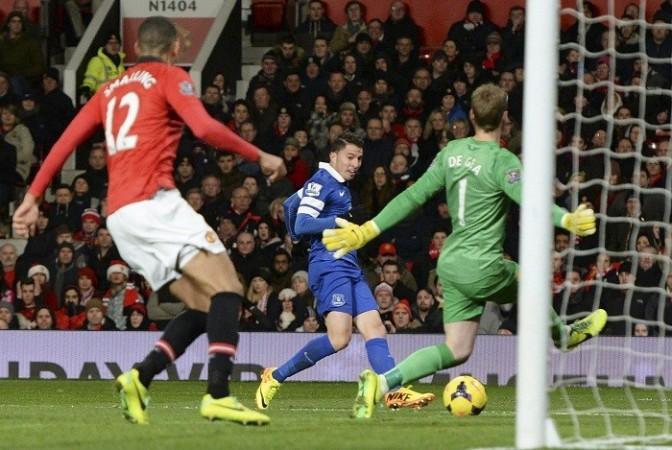Everton's Bryan Oviedo slots in the winner against Manchester United in their English Premier League game, December 4. Reuters Oviedo Everton Manchester United De Gea