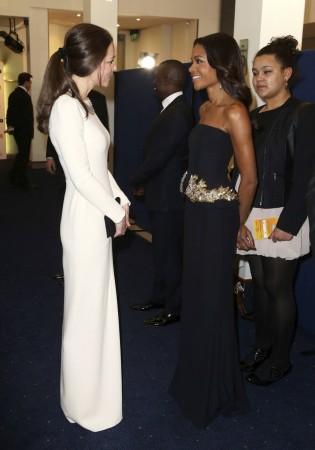 Catherine, the Duchess of Cambridge meets cast member Naomie Harris at the Royal Premiere of  Kate Middleton, Naomie Harris