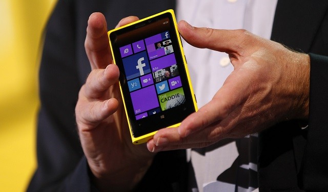 Microsoft CEO Steve Ballmer displays a Nokia Lumia 920 in San Francisco.