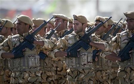Iranian soldiers march in formation during the Army Day military parade in Tehran April 18, 2011.
