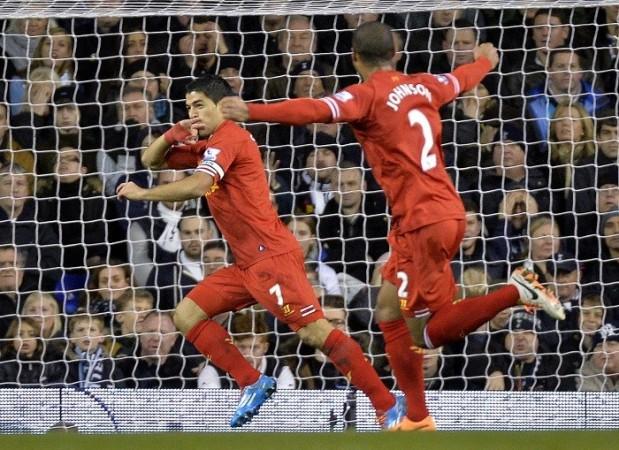 Liverpool striker Luis Suarez celebrates after scoring against Tottenham in the English Premier League, December 15. Reuters Luis Suarez Liverpool Glen Johnson