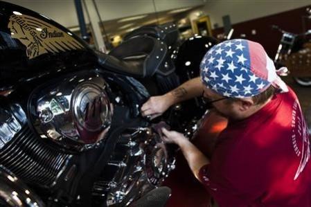 A mechanic checks the engine of an Indian motorcycle at the showroom of Indian Motorcycles of Northern New Jersey in Union, August 20, 2013.(Reuters) A mechanic checks the engine of an Indian motorcycle at the showroom of Indian Motorcycles of Northern New Jersey in Union, August 20, 2013.
