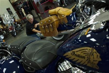 A worker cleans an Indian motorcycle before moving it to the showroom at Indian Motorcycles of Northern New Jersey in Union, August 20, 2013 (Reuters) A worker cleans an Indian motorcycle before moving it to the showroom at Indian Motorcycles of Northern New Jersey in Union, August 20, 2013