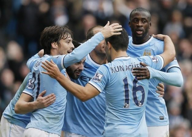 Manchester City face the unenvious task of toppling Barcelona. Reuters Manchester City Yaya Toure David Silva