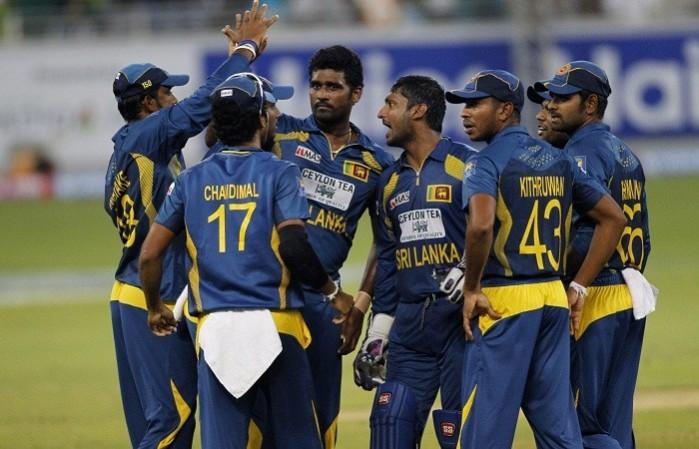 Sri Lanka players celebrate a Pakistan wicket in the second T20, December 13. Reuters Sri Lanka Perera Sangakkara