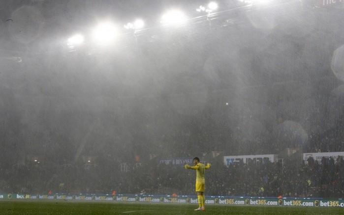Manchester United goalkeeper David De Gea braves the storm during the Capital One Cup quarterfinal encounter against Stoke, December 18. Reuters David De Gea Manchester United