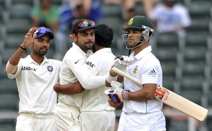 Mohammed Shami celebrates with Virat Kohli and Ajinkya Rahane after dismissing JP Duminy in the final day of the first Test in Johannesburg, December 22. Reuters India Kohli Duminy Rahane Shami