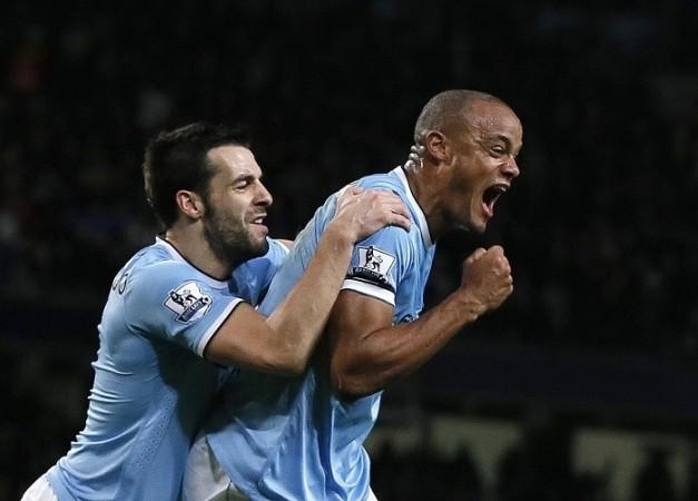 Manchester City's Vincent Kompany and Alvaro Negredo celebrate a goal against Liverpool, December 26. Reuters Kompany Negredo Manchester City