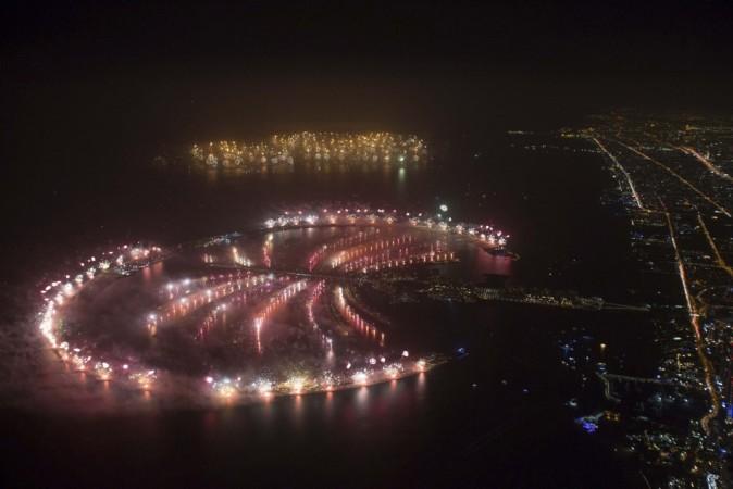 Fireworks explode in the sky across the whole of The Palm Jumeirah and the The World Islands during an attempt to break the Guinness World Record for the 'Largest Firework Display' in Dubai New Year 2014