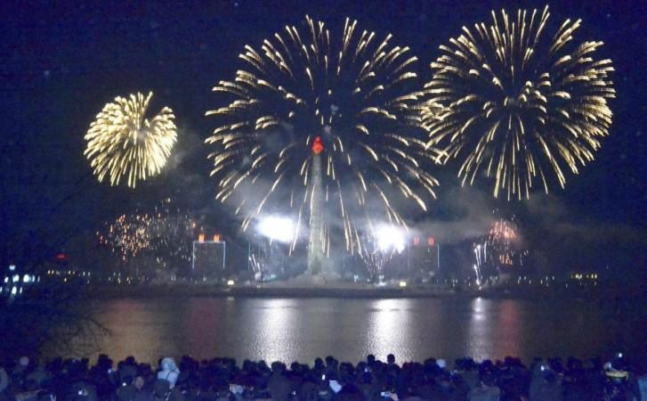Fireworks explode in the sky over Pyongyang as part of New Year celebrations in this undated photo released by North Korea's Korean Central News Agency New Year 2014