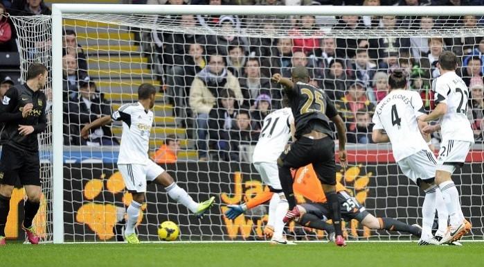 Manchester City midfielder Fernandinho scores the opening goal against Swansea in the English Premier League, January 1. Reuters Manchester City Fernandinho Swansea