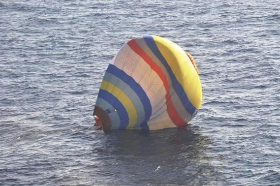 A hot-air balloon drifting on the ocean is seen in the East China Sea near the disputed isles known as Senkaku isles in Japan and Diaoyu islands in China