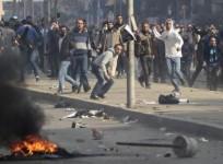 supporters-of-muslim-brotherhood-and-ousted-egyptian-president-mohamed-mursi-clash-with-riot-police-during-clashes-at-nasr-city-district-in-cairo-january-3-2014