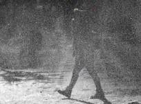 a-woman-walks-through-a-gust-of-blowing-snow-in-frigid-cold-temperatures-during-winter-in-downtown-chicago-illinois-january-6-2014