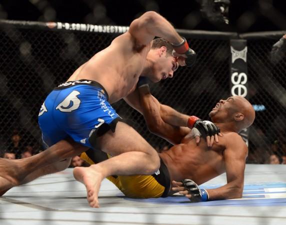 Anderson Silva (in yellow shorts) will face a possible suspension after being tested positive for Steroids MMA: UFC 168-Weidman vs Silva