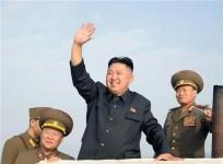 north-korean-leader-kim-jong-un-c-waves-as-he-visits-military-units