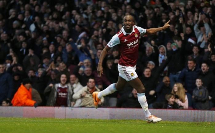 West Ham striker Carlton Cole celebrates after scoring against Arsenal in the English Premier League, December 26. Reuters Carlton Cole West Ham