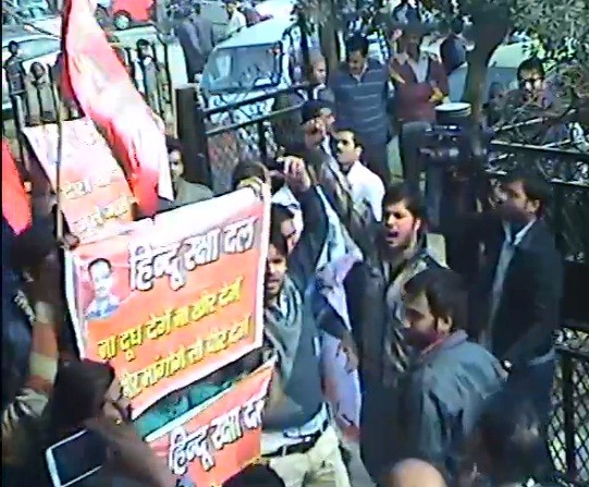 Hindu Raksha Dal activists pose for cameras after vandalizing AAP office in Ghaziabad 8 January 2013