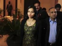 devyani-khobragade-walks-with-her-father-uttam-khobragade-r-upon-her-arrival-at-maharashtra-sadan-state-guesthouse-in-new-delhi-january-10-2014