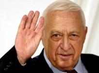 israeli-prime-minister-ariel-sharon-gestures-at-the-end-of-his-likud-partys-women-conference-in-tel-aviv-in-this-march-10-2005