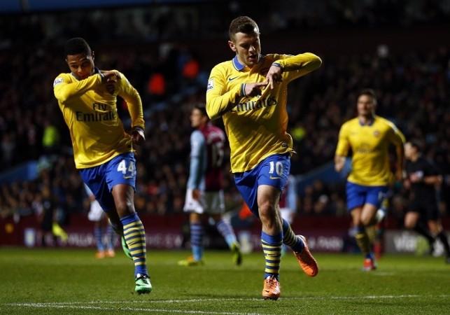 Arsenal midfielder Jack Wilshere celebrates his goal against Aston Villa in the English Premier League, January 13. Reuters Wilshere Gnabry Arsenal