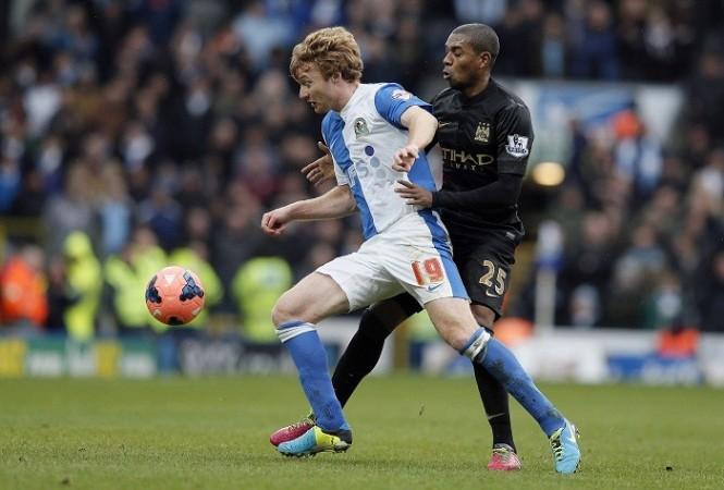 Blackburn's Chris Taylor and Manchester City midfielder Fernandinho fight for possession during their FA Cup third round game, January 4. Reuters Blackburn Chris Taylor Fernandinho Manchester City