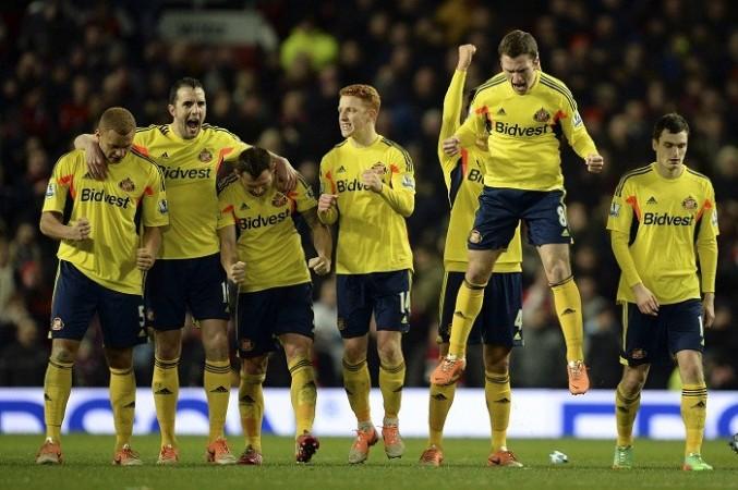 Sunderland players are ecstatic after defeating Manchester United in a penalty shootout. Reuters Sunderland