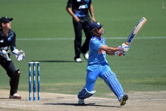 India skipper MS Dhoni admires a six during the 4th ODI against New Zealand, 28 January. BCCI MS Dhoni India Luke Ronchi New Zealand