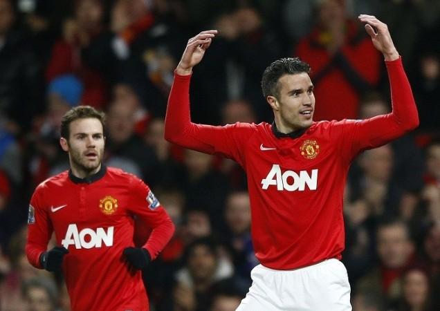 Manchester United debutant Juan Mata looks on as Robin Van Persie celebrates his goal against Cardiff in the English Premier League, 28 January. Reuters Juan Mata Robin Van Persie Manchester United
