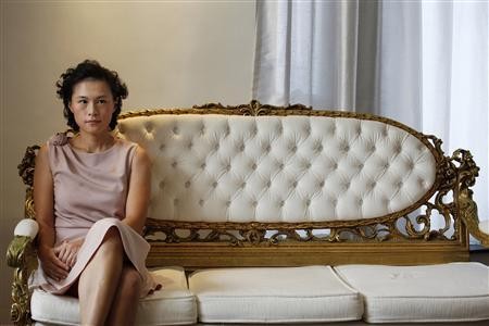 Gigi Chao, the daughter of Hong Kong property tycoon Cecil Chao Sze-tsung, poses at the conference room of her office in Hong Kong September 27, 2012.