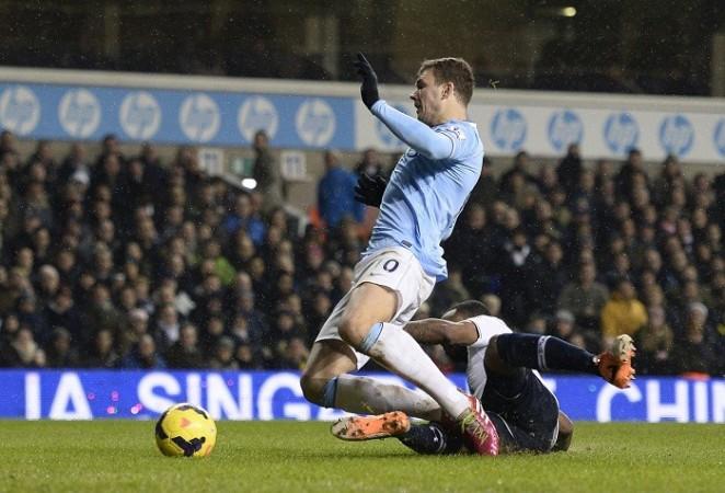 Tottenham defender Danny Rose challenges Edin Dzeko inside the penalty box in their English Premier League game, 29 January. Reuters Edin Dzeko Manchester City Danny Rose Tottenham