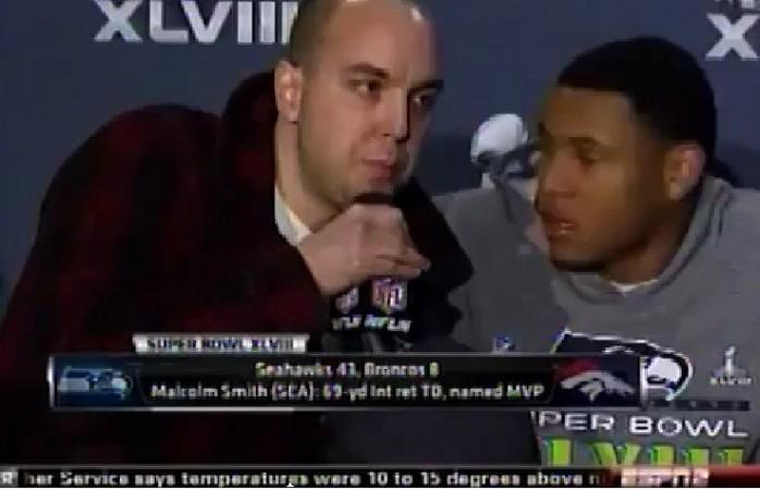30 year old,Matthew Mills grabbed eh microphone from Malcolm Smith and shouted 30 year old,Matthew Mills grabbed eh microphone from Malcolm Smith and shouted