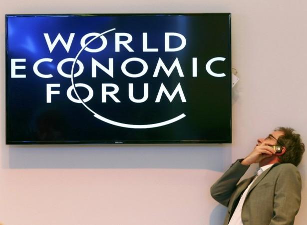 The WEF pointed out major shortcomings in some of the basic enablers of competitiveness. A participant speaks on his mobile phone between sessions during the annual meeting of the World Economic Forum (WEF) in Davos January 22, 2014. REUTERS/Ruben Sprich