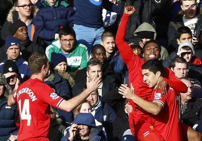 Daniel Sturridge celebrates with Luis Suarez and Jordan Henderson after scoring against West Brom in the English Premier League, 2 February. Reuters Liverpool Suarez Sturridge Henderson
