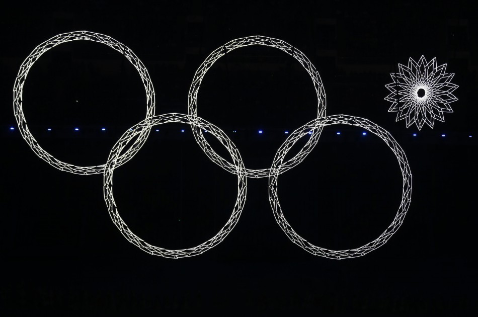 Four out of five Olympic rings are seen lit up during the opening ceremony of the 2014 Sochi Winter Olympics, February 7, 2014.  Sochi Olympics 2014