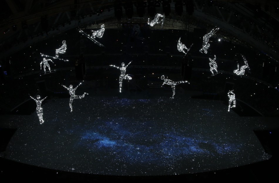 Suspended figures representing different winter sports are illuminated during the opening ceremony for the 2014 Sochi Winter Olympics February 7, 2014.  Sochi Olympics 2014