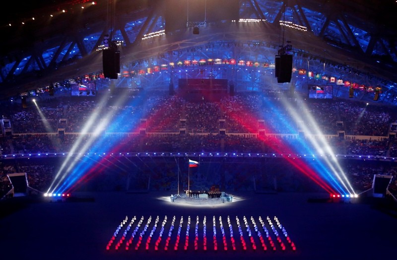 The Russian flag is being raised during the opening ceremony of the 2014 Sochi Winter Olympics, February 7, 2014. Sochi Olympics 2014